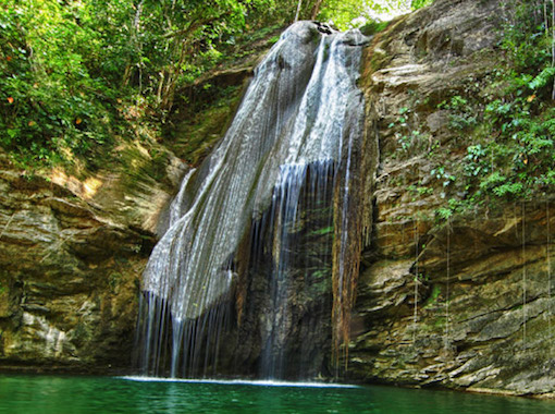 The Kwame waterfall between 8 Rios and Port Antonio in Jamaica This is a Waterfall and natural pond between 8 Rivers and Port Antonio.
